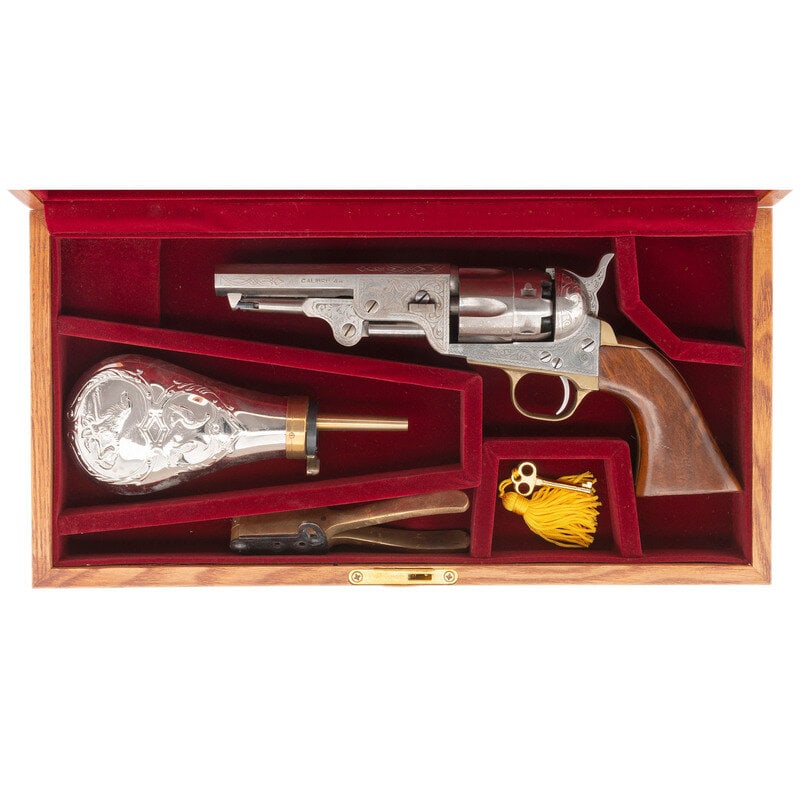 Cased Italian Reproduction Engraved Colt Type Percussion Revolver with Accessories: Cased Italian Reproduction Engraved Colt Type Percussion Revolver with Accessories .44 caliber. 5" octagonal barrel. SN: 411566. Plated finish, brass backstrap and triggerguard, one-piece smooth hardw