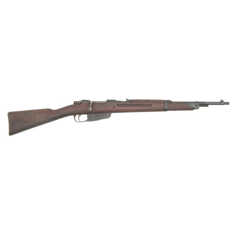 **RE Terni Carcano Rifle: **RE Terni Carcano Rifle 7.35x51mm. 21" barrel length. SN:12496. Blued metal finish with polished bolt mounting wood straight wrist stock and rear notch with front blade sights. Bolt action internal