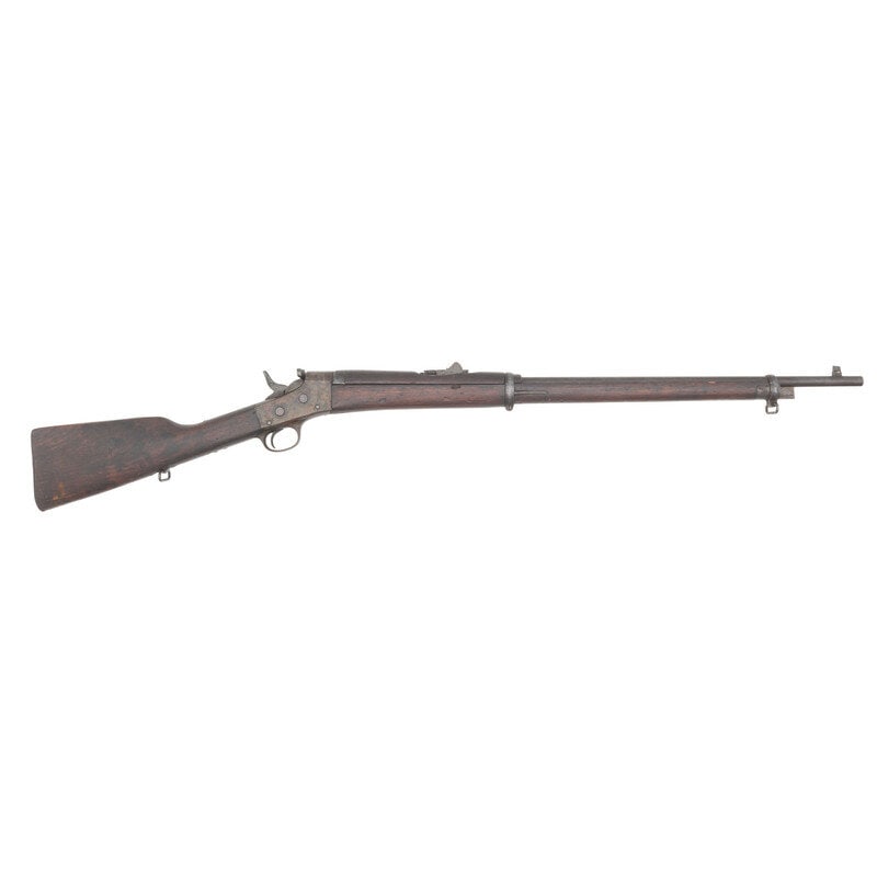 **Remington Model 1902 Rolling Block Military Rifle in 7mm Mauser: **Remington Model 1902 Rolling Block Military Rifle in 7mm Mauser 7x57 Spanish Mauser. 30" barrel. NSN. Blued and color casehardened finish, iron furniture, walnut stock. Single shot military rolling