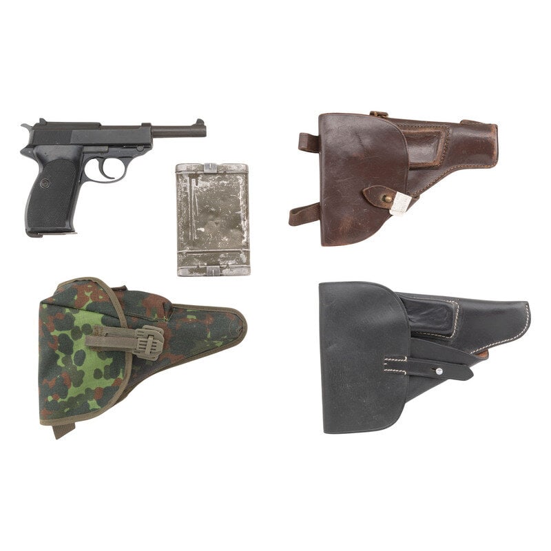 *Walther P.1 Pistol in Box with Accessories: *Walther P.1 Pistol in Box with Accessories 9mm Para. 4.9" barrel length. SN: 020327. Blued finish with a black Anodized frame mounting checkered black synthetic grips and military pattern sights.