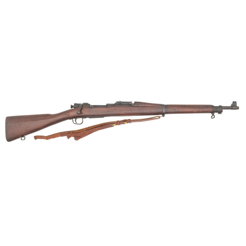 **U.S. Remington 1903 Rifle : **U.S. Remington 1903 Rifle World War II .30-06. 24" barrel length. SN: 3283697. Parkerized metal finish fitted into walnut straight stock with full length upper handguard mounting rear ladder sight a