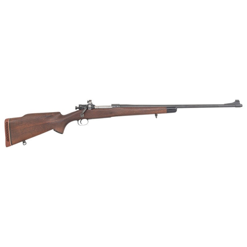 **Springfield Model 1903 Mark I Custom with Sedgley Barrel and Redfield Sights: **Springfield Model 1903 Mark I Custom with Sedgley Barrel and Redfield Sights .30-06. 24" barrel length. SN: 1095291. Blued metal finish mounting walnut Monte-Carlo style stock with White Line