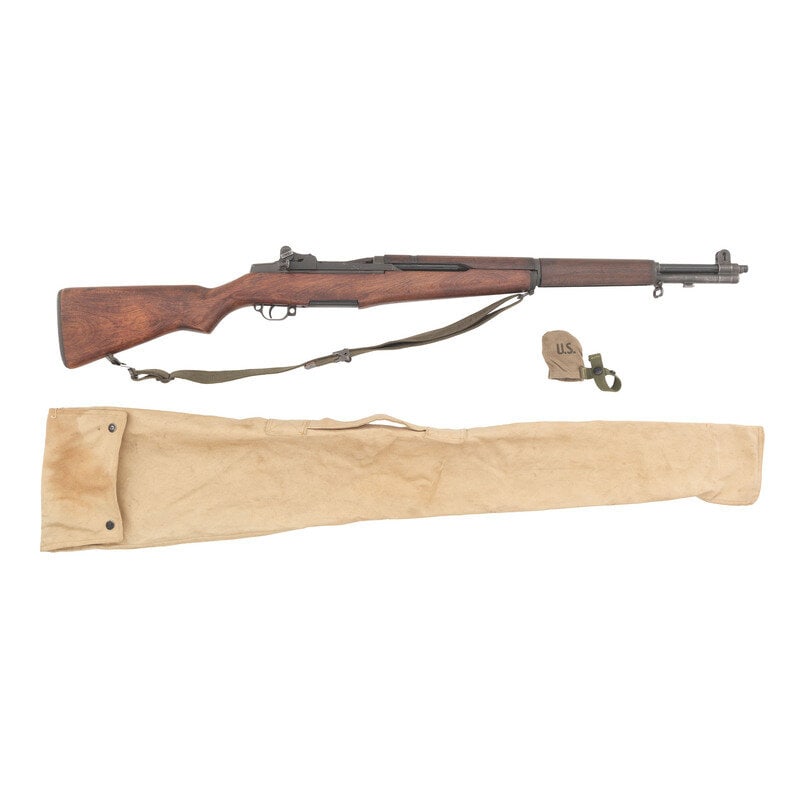 **US Model M1 Garand Rifle by Springfield with Accessories : **US Model M1 Garand Rifle by Springfield with Accessories World War II - Korean War .30-06. 24" barrel length. SN: 2186677. Parkerized metal refinish in walnut semi-pistol grip stock mounting