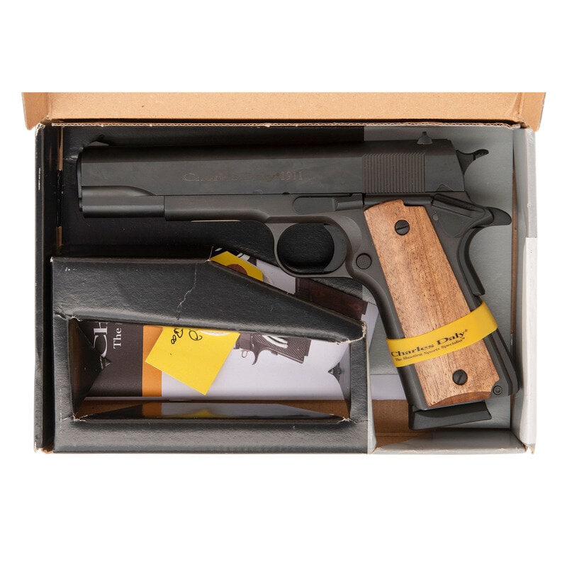 *Charles Daly 1911 Brixia 9mm Pistol by Chiappa in Box: *Charles Daly 1911 Brixia 9mm Pistol by Chiappa in Box 9mm Para. 5" barrel length. SN: KTIT22W0992. Parkerized metal finish with smooth wood grips mounting military pattern sights, arched mainspring h