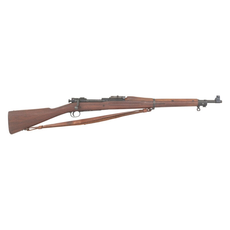 **Springfield Model 1903 Rifle: **Springfield Model 1903 Rifle .30-06. 24" barrel length. SN: 1306604. Parkerized metal finish fitted in walnut straight stock mounting rear adjustable ladder sight and front hooded blade sight. Bolt
