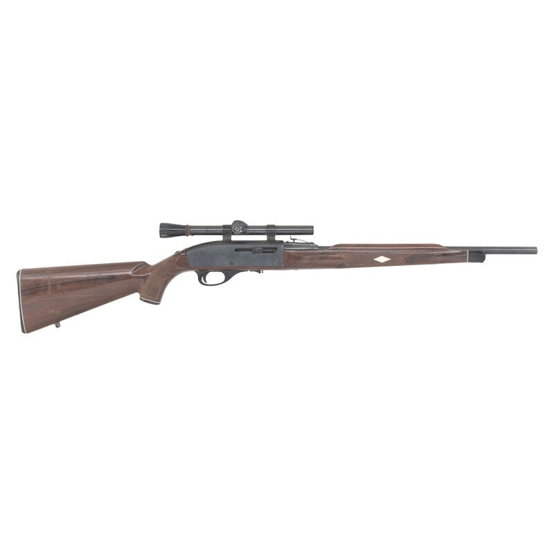**Remington Nylon 66 Mohawk Brown Detachable Magazine Model with Weaver Scope: **Remington Nylon 66 Mohawk Brown Detachable Magazine Model with Weaver Scope .22 LR. 19.5" barrel length. SN: 2477727. Blued metal finish overall mounting Mohawk brown nylon synthetic stock with whit