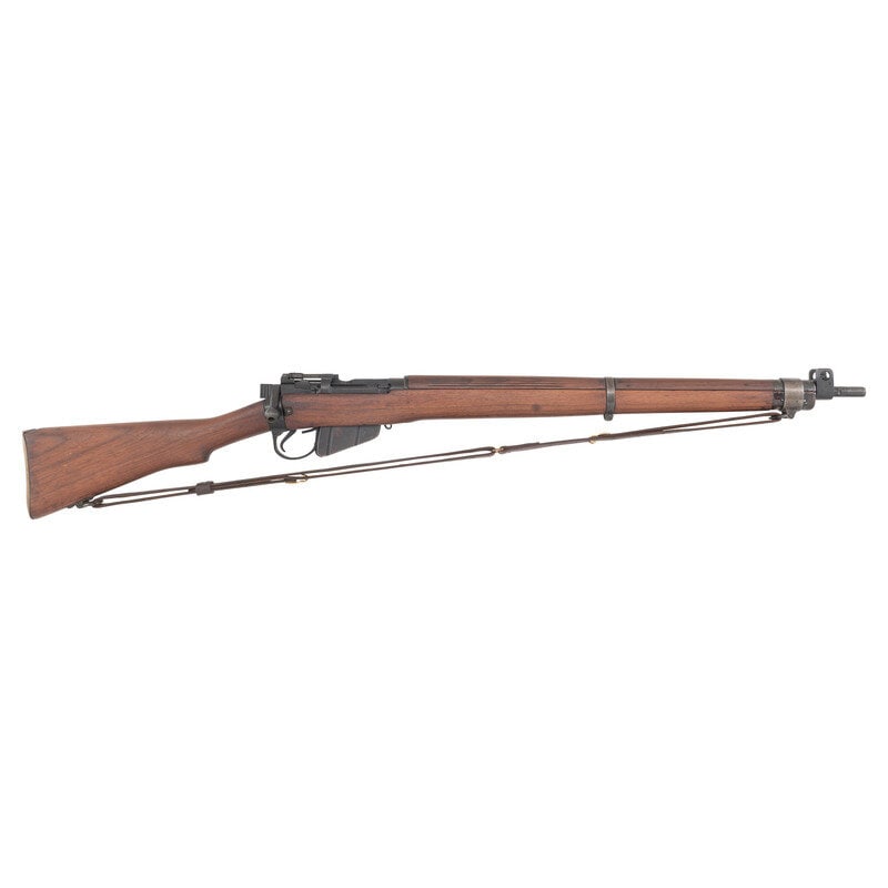 **Enfield No. 4 MK I Rifle: **Enfield No. 4 MK I Rifle .303 British. 25" barrel length. SN: 11870. Blued metal finish mounting wood semi pistol grip stock with full length upper handguard. Bolt action repeating rifle fed by semi