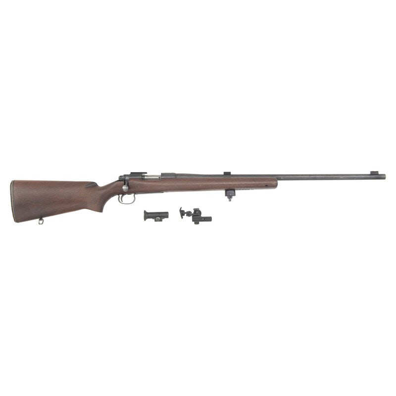 **U.S.M.C. Property Marked Remington Model 40-X Rifle with CMP Box: **U.S.M.C. Property Marked Remington Model 40-X Rifle with CMP Box .22 LR. 28" barrel length. SN: 6411. Blued metal finish with polished bolt set in walnut semi-pistol grip stock with hand stop slot