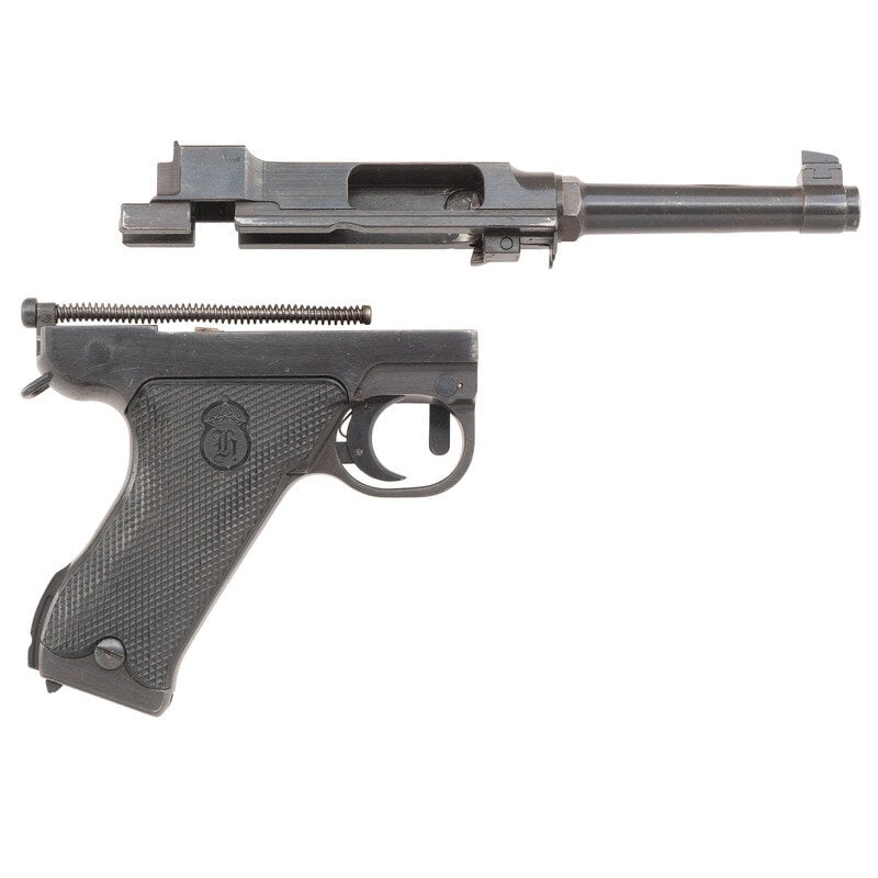 **Incomplete Danish Police Issue Husqvarna Lahti Model 40 Pistol: **Incomplete Danish Police Issue Husqvarna Lahti Model 40 Pistol 9mm Para. 4.6" barrel length. SN: D9899. Blued metal finish with checkered Husqvarna logo black synthetic grips. Short recoil