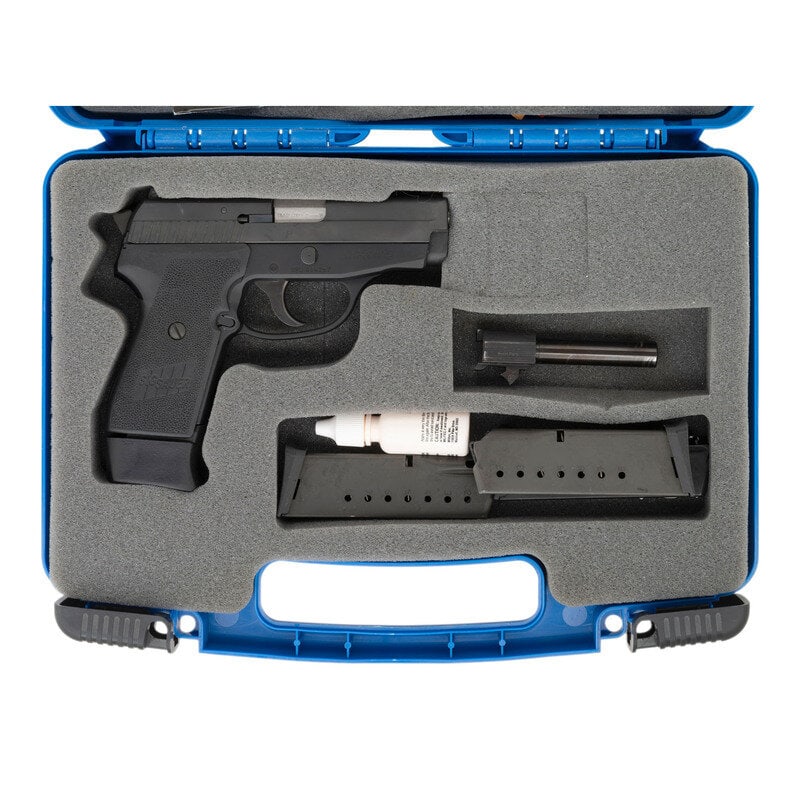 *Sig P239 in Box with Accessories: *Sig P239 in Box with Accessories 9mm Para. 3.6" barrel length. SN: SBU004267. Nitron finished slide with brushed barrel and black anodized frame mounting two-piece textured black synthetic grips with