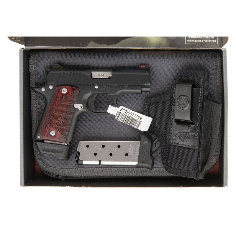 *Kimber Micro 9 in Box: *Kimber Micro 9 in Box 9mm Para. 3.15" barrel length. SN: SCB0071709. Black Oxide finished slide and frame with brushed stainless barrel mounting Kimber logo marked and checkered red laminated wood gr