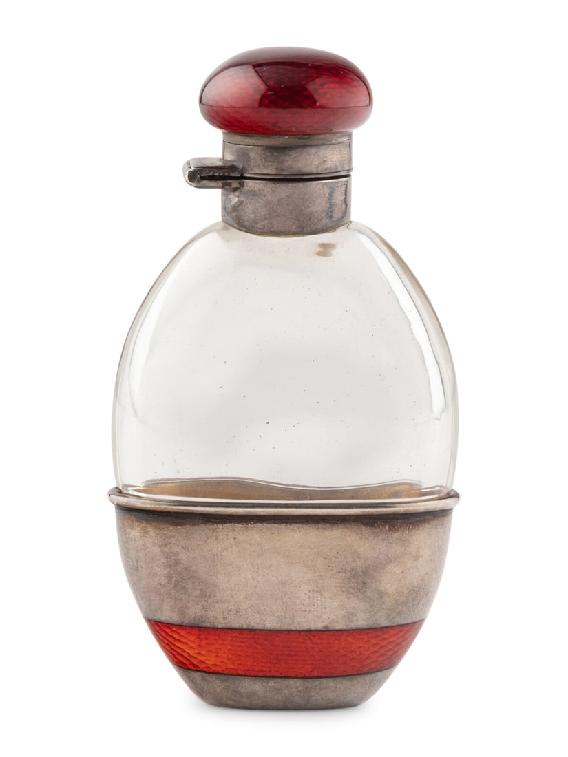A Russian Silver, Guilloché Enamel and Glass Flask: A Russian Silver, Guilloché Enamel and Glass Flask Early 20th Century the silver and guilloché-banded base detaching and usable as a cup, marked with '88' standard on base and on interior of