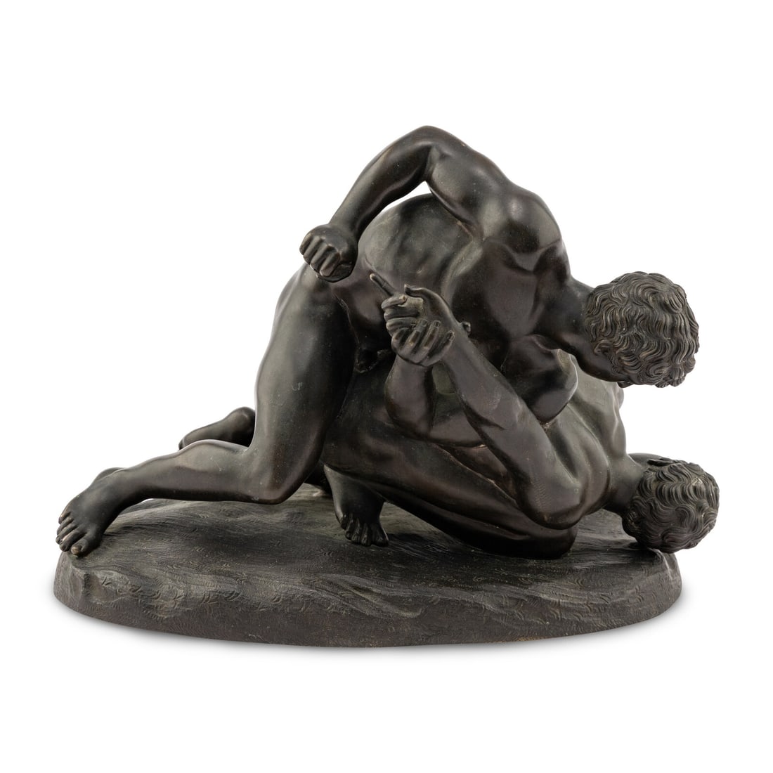 A Grand Tour Bronze Figural Group of The Wrestlers: A Grand Tour Bronze Figural Group of The Wrestlers After the Antique, 19th Century Height 9 1/2 x width 12 x depth 7 inches. Property from the Estate of Philip Rosenblum, Santa Monica, California This