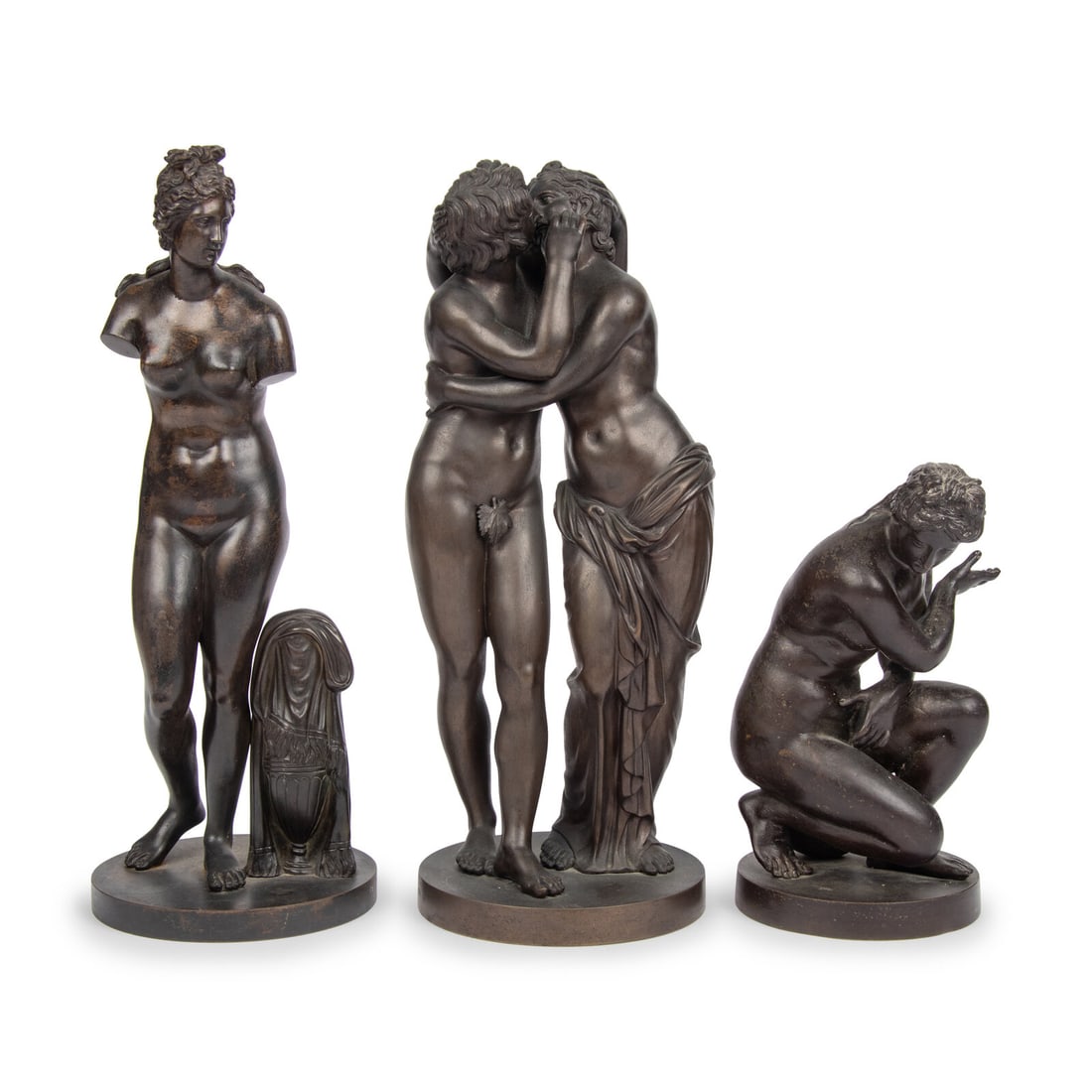 Three Grand Tour Bronze Figural Groups: Three Grand Tour Bronze Figural Groups 19th Century, After the Antique including a Crouching Venus, Venus of Knidos, and Cupid and Psyche. Height of tallest 13 1/2 inches. Property from the Estate of