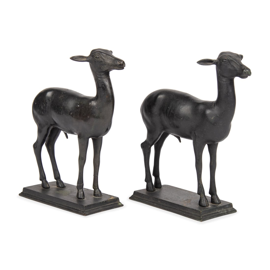 A Pair of Grand Tour Bronze Models of the Pompeian Deer: A Pair of Grand Tour Bronze Models of the Pompeian Deer After the Antique, 19th Century Height 8 x width 3 x depth 5 3/4 inches. Property from the Estate of Bliss Hebert and Allen Charles Klein, Miami
