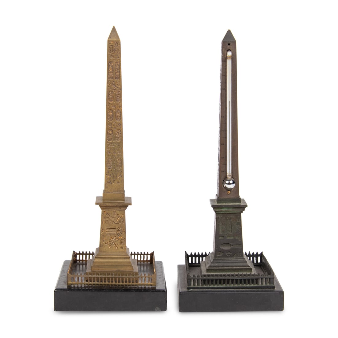 Two Grand Tour Bronze Luxor Obelisk Thermometers: Two Grand Tour Bronze Luxor Obelisk Thermometers 19th Century one example gilt bronze, the second patinated; the gilt example missing its thermometer. Height 10 inches. Property from the Estate of Bli