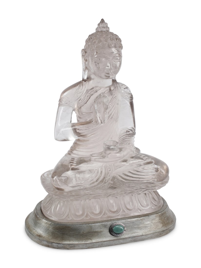 A Large Rock Crystal Seated Figure of Buddha: A Large Rock Crystal Seated Figure of Buddha 20th Century raised on a silvered wood stand. Height overall 18 x width 13 x depth 7 1/2 inches. This lot is located in Chicago.