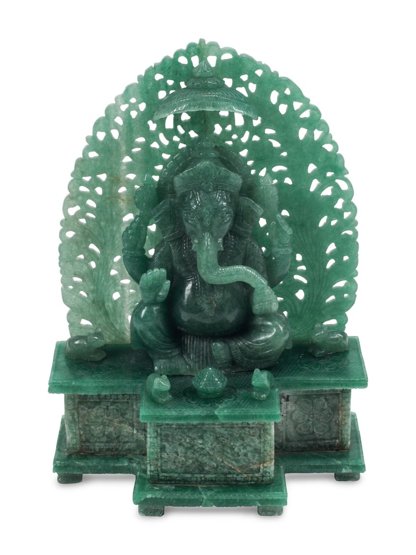 A Carved Green Jasper Figure of a Deity (1 of 3)