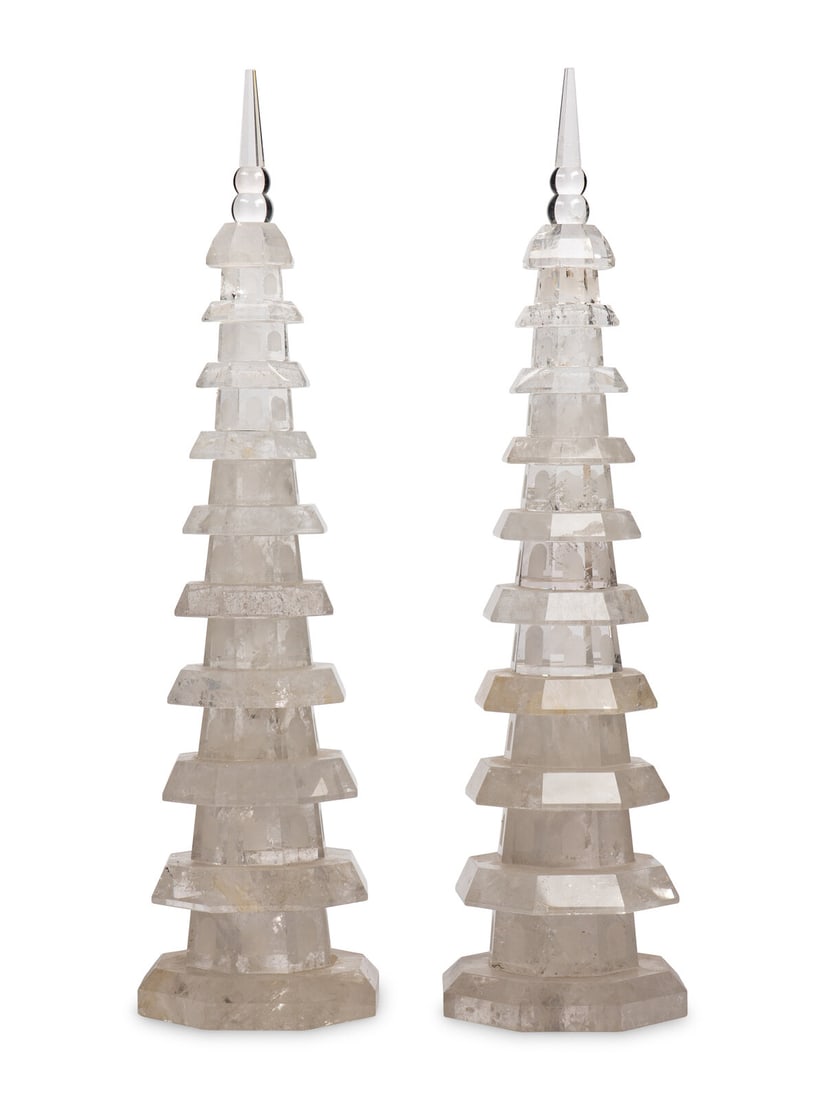 A Pair of Carved Rock Crystal Pagodas: A Pair of Carved Rock Crystal Pagodas 20th Century Height 19 1/2 x width 5 x depth 5 inches. Property from the Estate of Andrew Cunningham Ware This lot is located in Chicago.