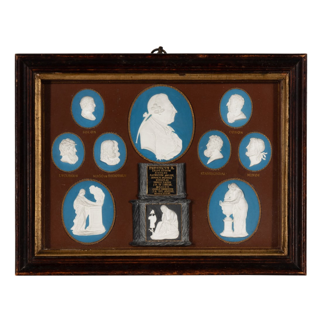 A Group of Painted Composition Portrait Medallions (1 of 3)