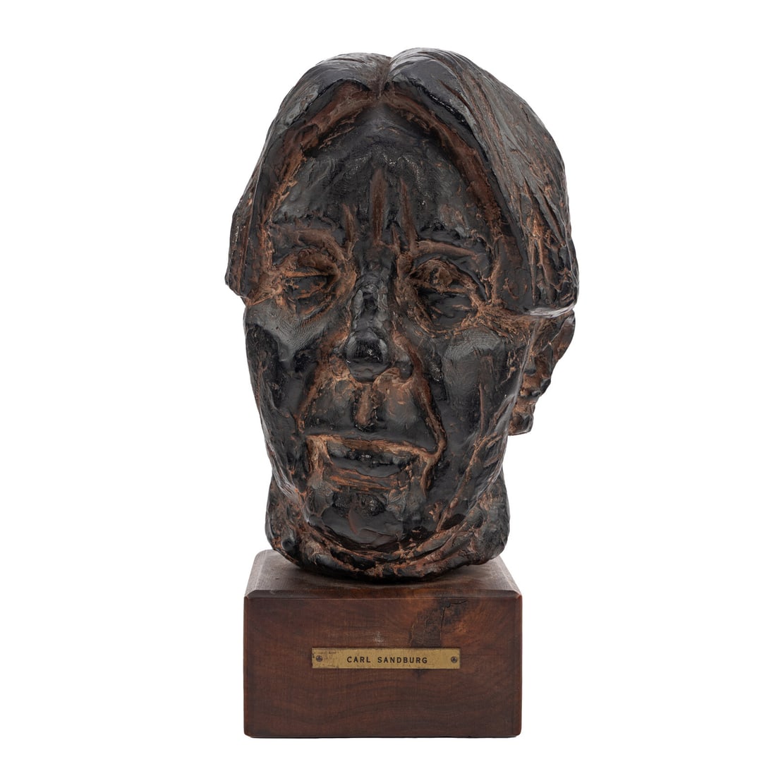 Joseph Konzal (American 1905-1994) A bust of Carl Sandburg previously owned by Marilyn Monroe,: Joseph Konzal (American 1905-1994) A bust of Carl Sandburg previously owned by Marilyn Monroe black-painted terra cotta bust on a walnut base 12 1/2 in. heigh x 6 1/2 x 8 3/4 in. wide A BUST OF CARL S