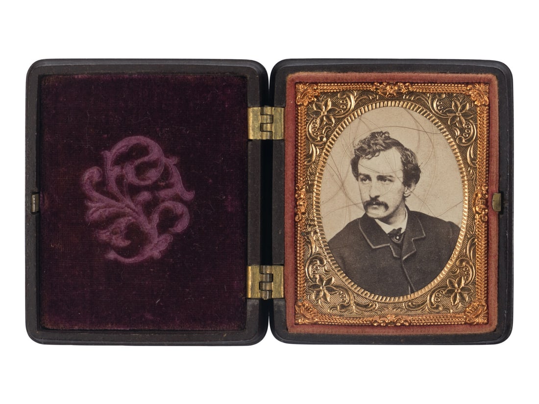 BOOTH, John Wilkes (1838-1865). Several strands of hair purportedly clipped from Booth's head at (1 of 2)