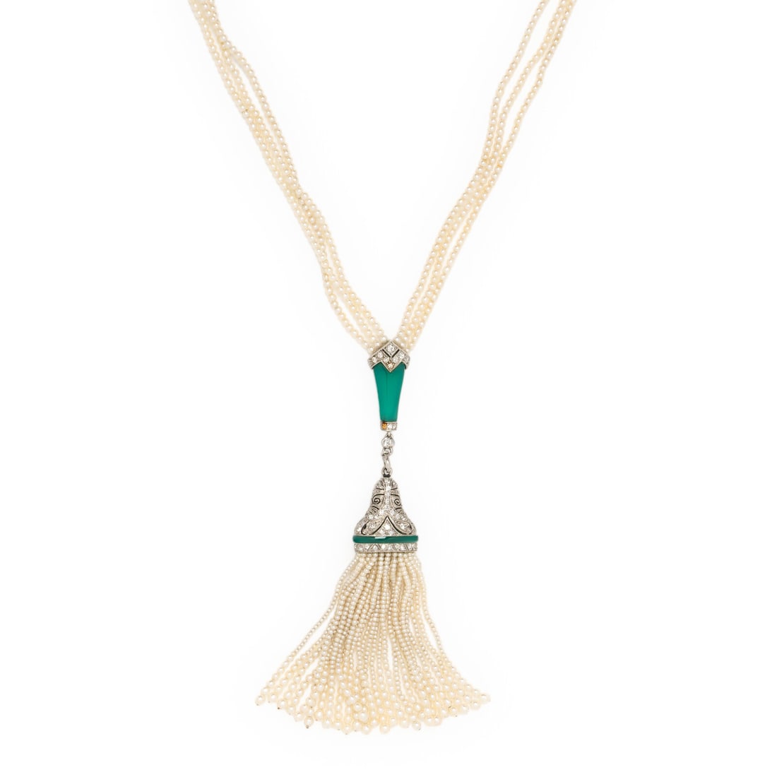 ART DECO, SEED PEARL, CHRYSOPRASE, AND DIAMOND SAUTOIR NECKLACE: ART DECO, SEED PEARL, CHRYSOPRASE, AND DIAMOND SAUTOIR NECKLACE A sautoir necklace comprised of three strands of seed pearls, punctuated with stations and a tassel cap set with carved chrysoprase, and