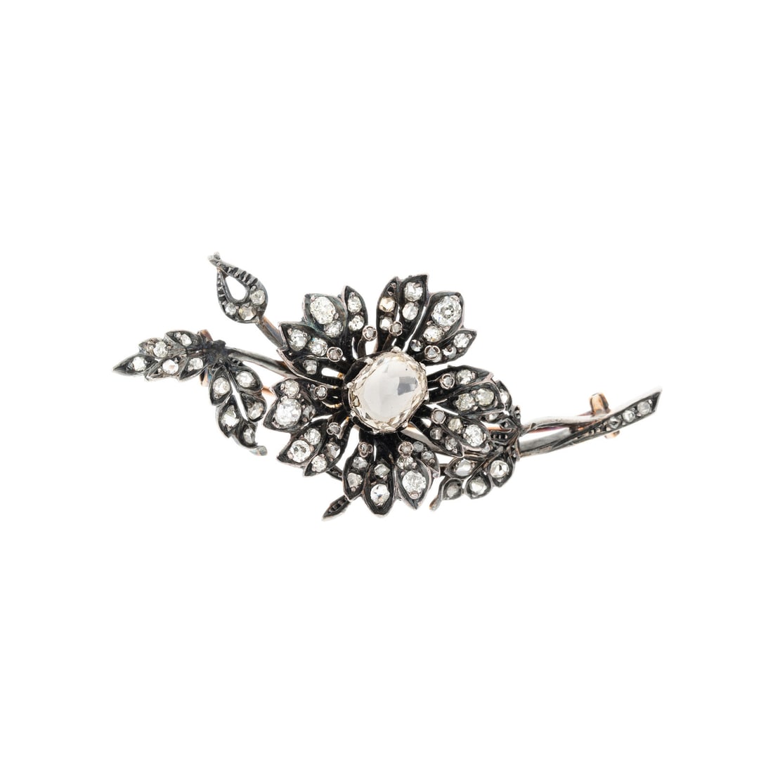 FRENCH, SILVER-TOPPED GOLD AND DIAMOND 'EN TREMBLANT' BROOCH: FRENCH, SILVER-TOPPED GOLD AND DIAMOND 'EN TREMBLANT' BROOCH The central en tremblant flower featuring an oval flat top diamond measuring approximately 10.20 x 8.00 mm, additionally set throughout