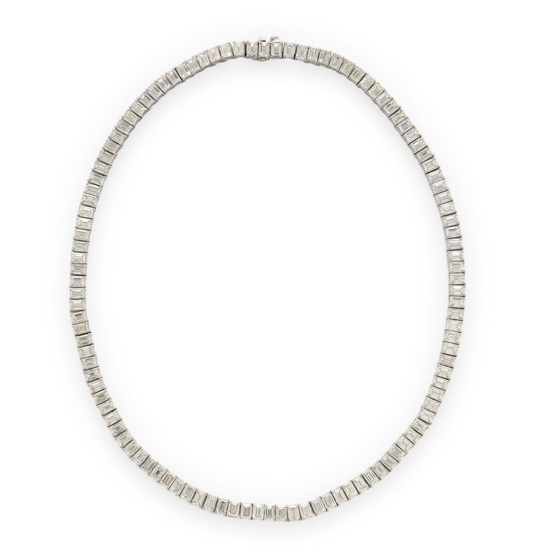 DIAMOND AND WHITE GOLD LINE NECKLACE: DIAMOND AND WHITE GOLD LINE NECKLACE Set throughout with emerald cut diamonds weighing approximately 34.68 carats total. Mounted in 18 karat white gold. 16 inches long. Stamp: 18K D 34.68. Gross weigh