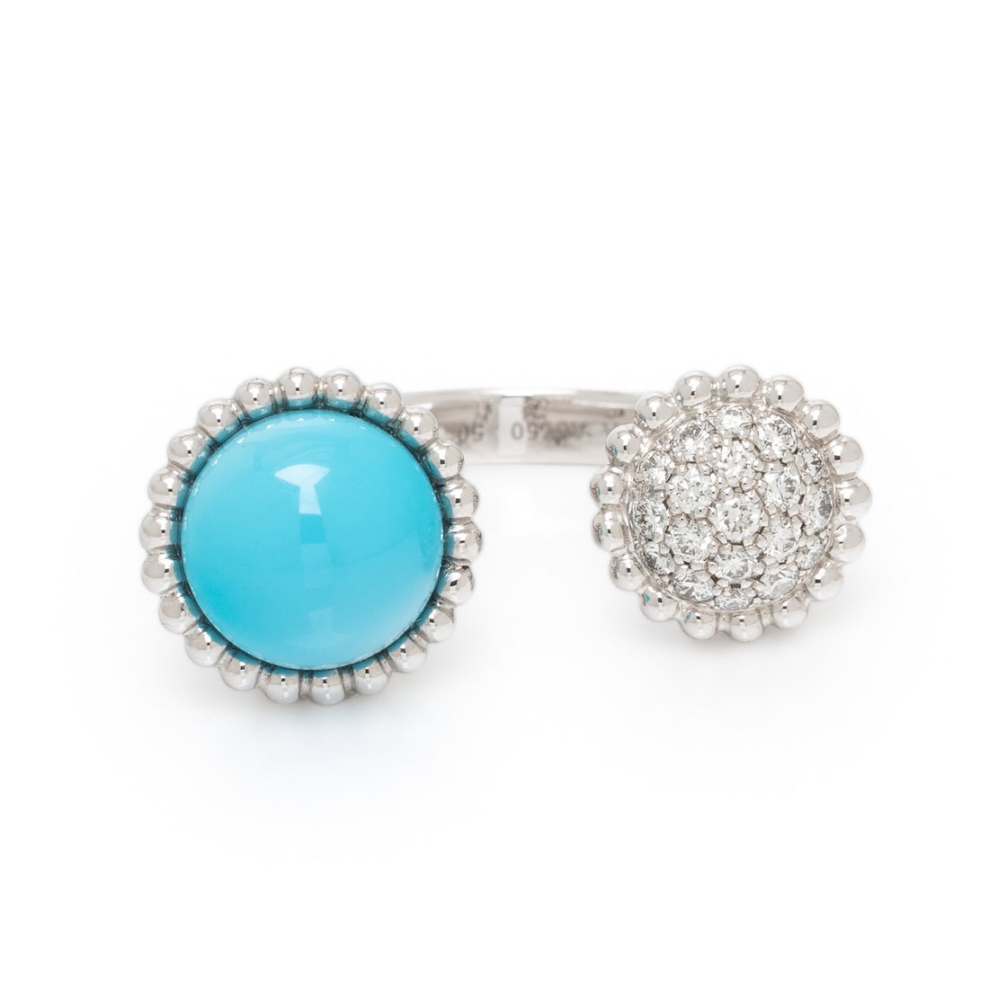VAN CLEEF & ARPELS, TURQUOISE, DIAMOND, AND WHITE GOLD 'PERLÉE COULEURS' RING: VAN CLEEF & ARPELS, TURQUOISE, DIAMOND, AND WHITE GOLD 'PERLÉE COULEURS' RING In a between-the-finger open design, with pavé-set round diamonds weighing approximately 0.35 carat total