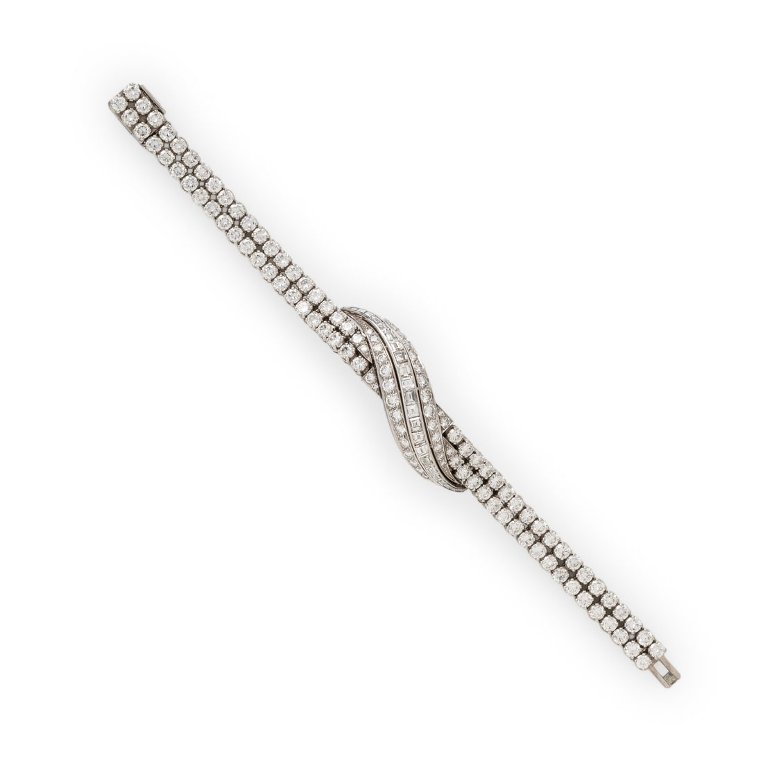 AUDEMARS PIGUET, DIAMOND AND PLATINUM SURPRISE WATCH: AUDEMARS PIGUET, DIAMOND AND PLATINUM SURPRISE WATCH Maker: Audemars Piguet Case number: 24691 Year: Circa 1950s Case size: Approx. 7 mm Case material: Platinum Bezel: Hidden dial with round and