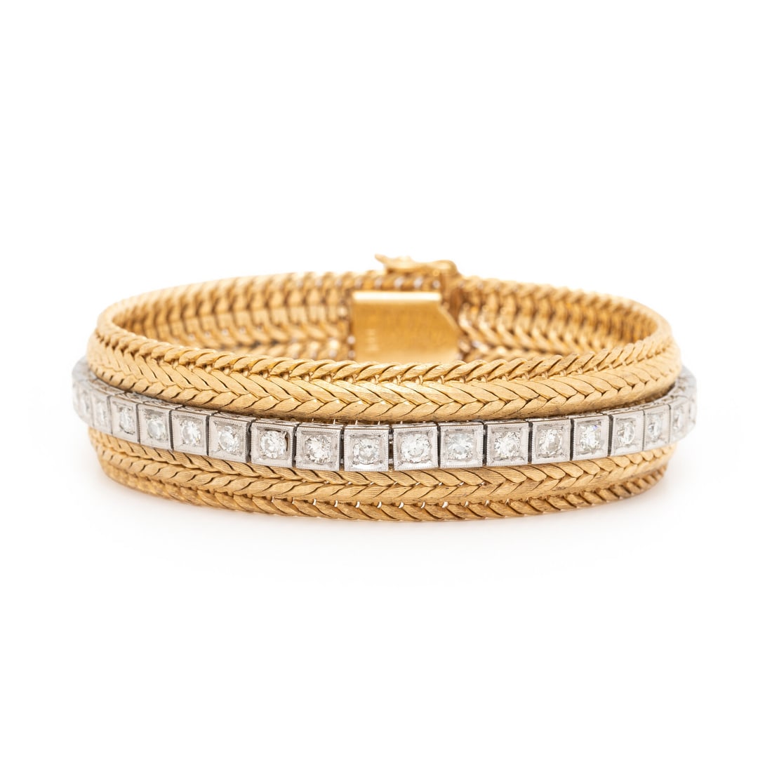 PLATINUM AND DIAMOND LINE BRACELET WITH A YELLOW GOLD JACKET: PLATINUM AND DIAMOND LINE BRACELET WITH A YELLOW GOLD JACKET Designed as a line bracelet set with round diamonds weighing approximately 2.75 carats total, to be worn on its own or together with the