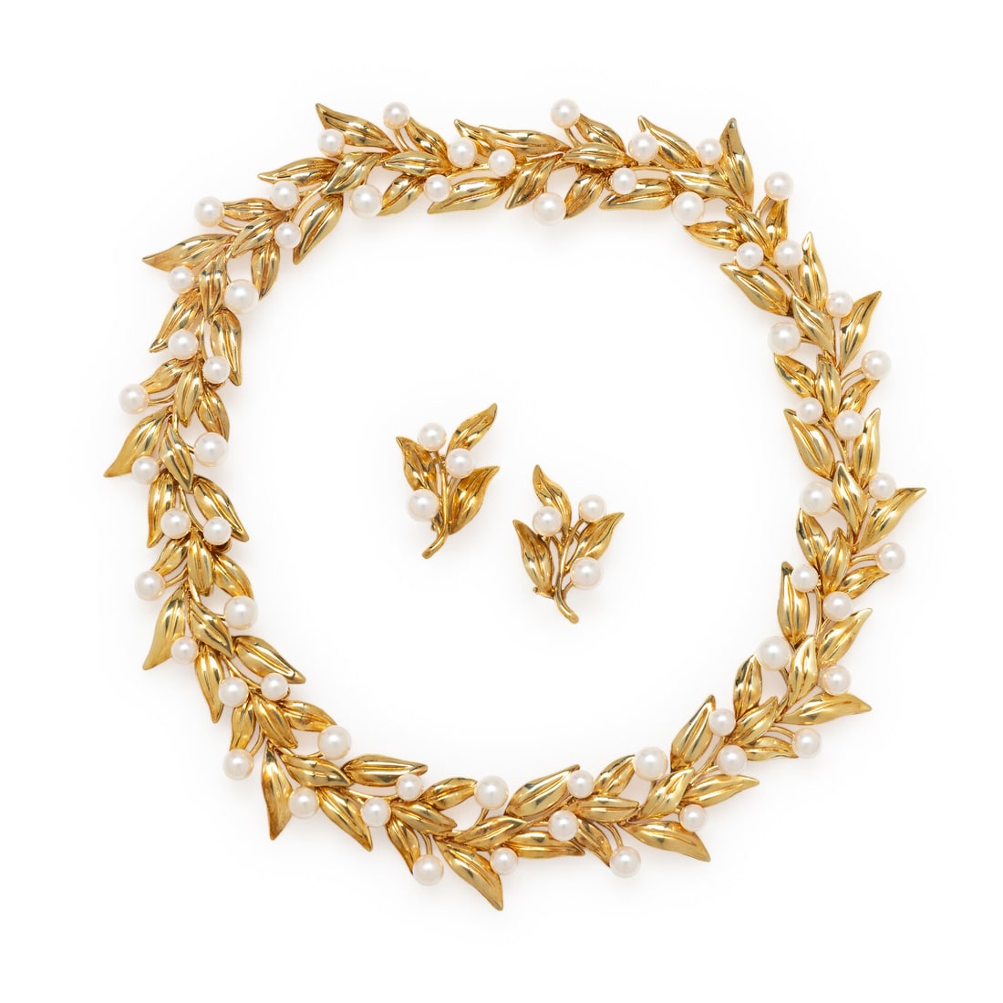 TIFFANY & CO., CULTURED PEARL AND YELLOW GOLD FOLIATE COLLAR NECKLACE AND EARRINGS: TIFFANY & CO., CULTURED PEARL AND YELLOW GOLD FOLIATE COLLAR NECKLACE AND EARRINGS In a foliate design, a necklace and a pair of earrings set with cultured pearls measuring approximately 5.00 -