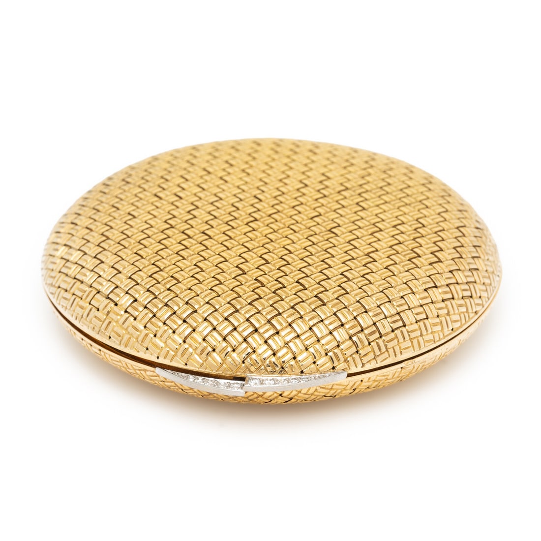 VAN CLEEF & ARPELS, YELLOW GOLD AND DIAMOND COMPACT WITH SUEDE SLIP COVER: VAN CLEEF & ARPELS, YELLOW GOLD AND DIAMOND COMPACT WITH SUEDE SLIP COVER With a woven design, a makeup compact with a thumbpiece set with round diamonds, a mirrored interior, pressed powder, and