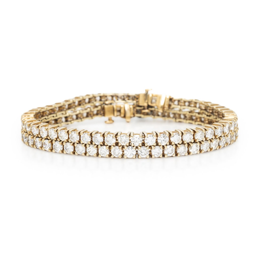 PAIR OF YELLOW GOLD AND DIAMOND LINE BRACELETS (1 of 4)