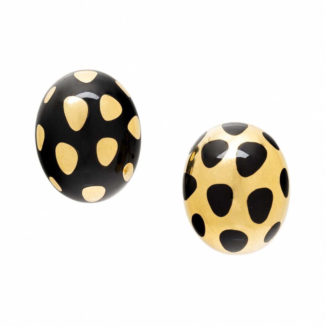 TIFFANY & CO., ANGELA CUMMINGS, BLACK JADE AND YELLOW GOLD 'POSITIVE NEGATIVE' EARRINGS: TIFFANY & CO., ANGELA CUMMINGS, BLACK JADE AND YELLOW GOLD 'POSITIVE NEGATIVE' EARRINGS In an asymmetric spotted design set with inlaid black jade. Mounted in 18 karat yellow gold. 1 inch long. St