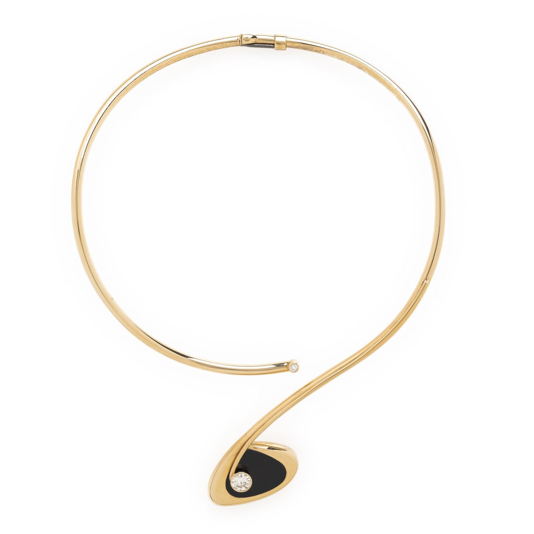 YELLOW GOLD, ONYX, AND DIAMOND TORQUE NECKLACE: YELLOW GOLD, ONYX, AND DIAMOND TORQUE NECKLACE In an open torque design, set with round diamonds weighing approximately 1.10 carats total and black onyx inlay, hinged at back. Mounted in 14 karat yell