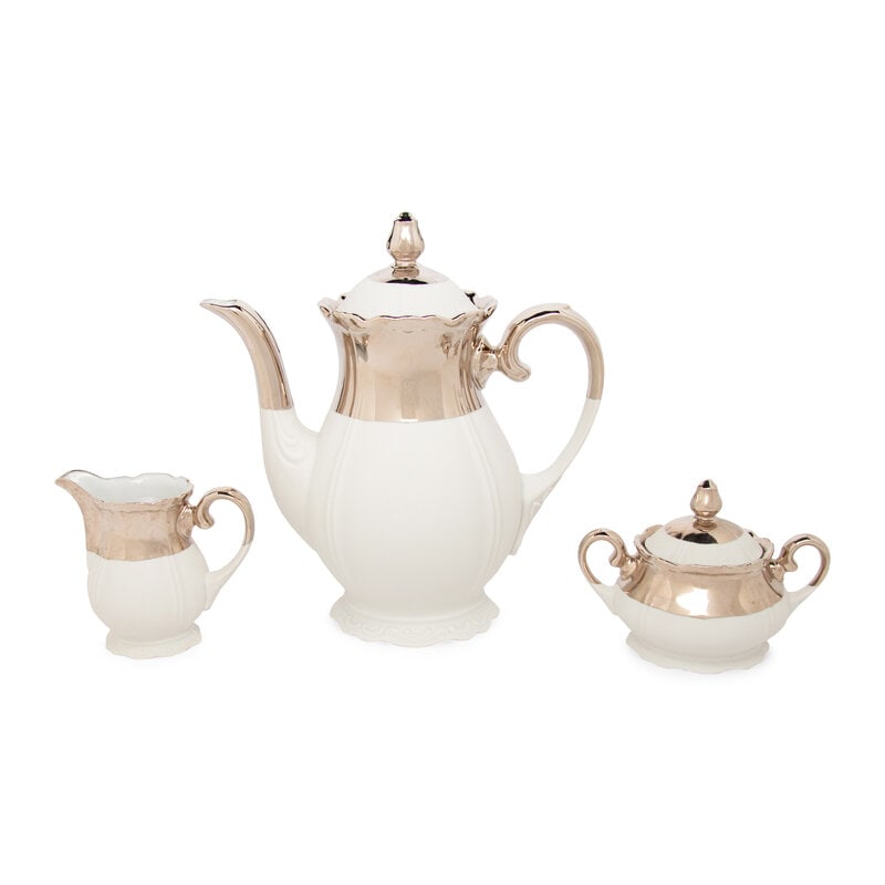 A Three-Piece Porcelain Coffee Service: A Three-Piece Porcelain Coffee Service Paola Navone for Reichenbach, 21st Century New Baroque pattern, comprising a coffee pot, a creamer, and a covered sugar. Height of coffee pot 10 1/2 inches. 