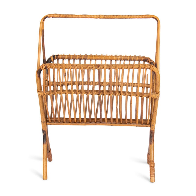 A Vintage Rattan Magazine Rack: A Vintage Rattan Magazine Rack Mid-20th Century Height 23 x width 17 x depth 9 1/2 inches. Property from an Alessandra Branca-Designed Chicago Residence This lot is located in Chicago. 
