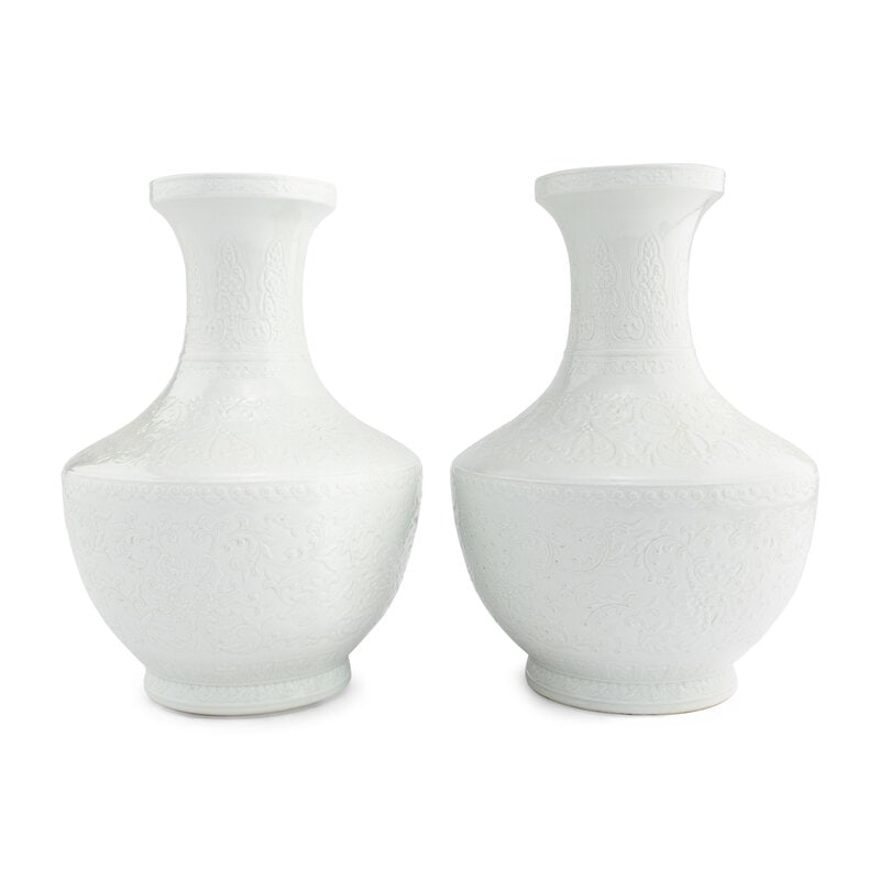 A Pair of Chinese Blanc-de-Chine Porcelain Vases: A Pair of Chinese Blanc-de-Chine Porcelain Vases 20th Century Height 20 x diameter 13 inches. Property from an Alessandra Branca-Designed Chicago Residence This lot is l