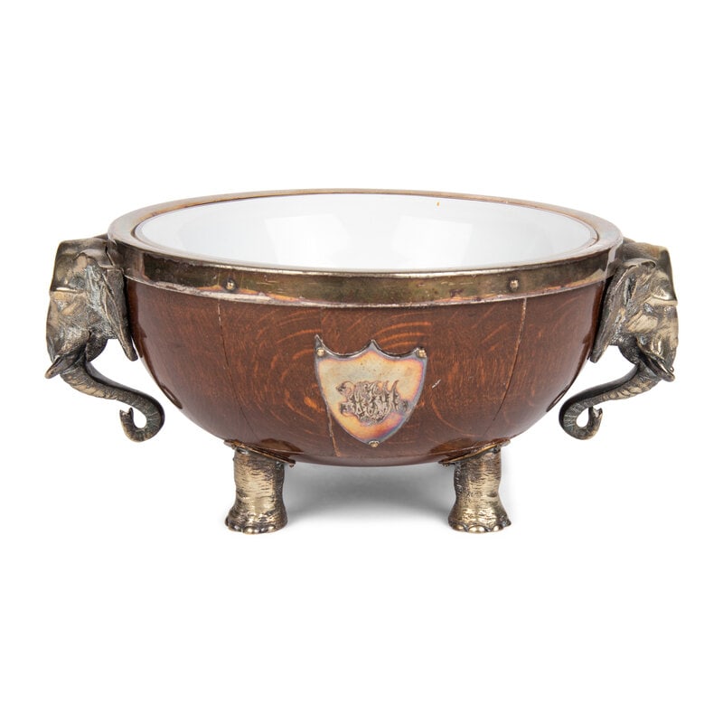 An English Silver-Plate Mounted Oak Bowl: An English Silver-Plate Mounted Oak Bowl Early 20th Century with a glass liner, monogrammed HJM and CEM. Height 5 5/8 x width 13 x depth 10 5/8 inches. Property from an Alessandra Branca-Designed
