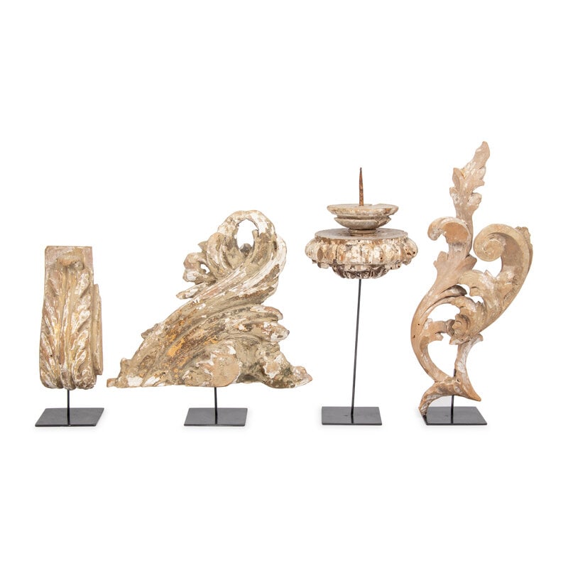 A Group of Four Carved and Painted Wood Fragments on Stands: A Group of Four Carved and Painted Wood Fragments on Stands 18th/19th Century Height of tallest 14 inches. Property from an Alessandra Branca-Designed Chicago Residence This lot is located in