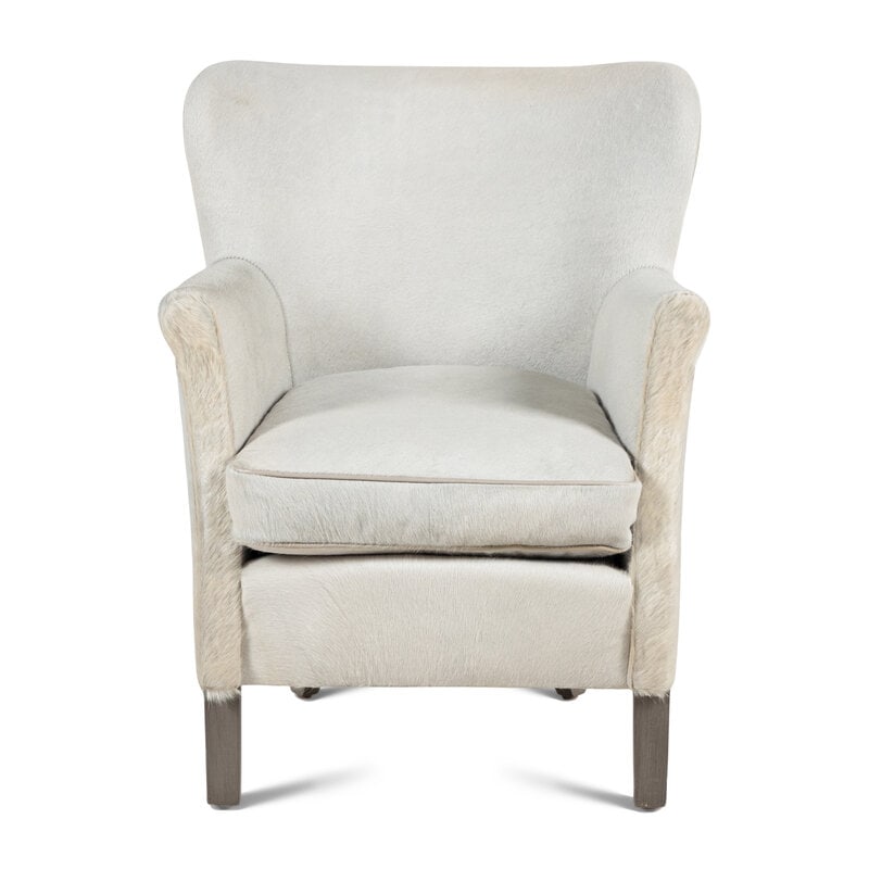 A Contemporary Cowhide Upholstered Armchair: A Contemporary Cowhide Upholstered Armchair Height 31 1/2 x width 26 x depth 29 inches. Property from an Alessandra Branca-Designed Chicago Residence This lot is located in Chicago. 