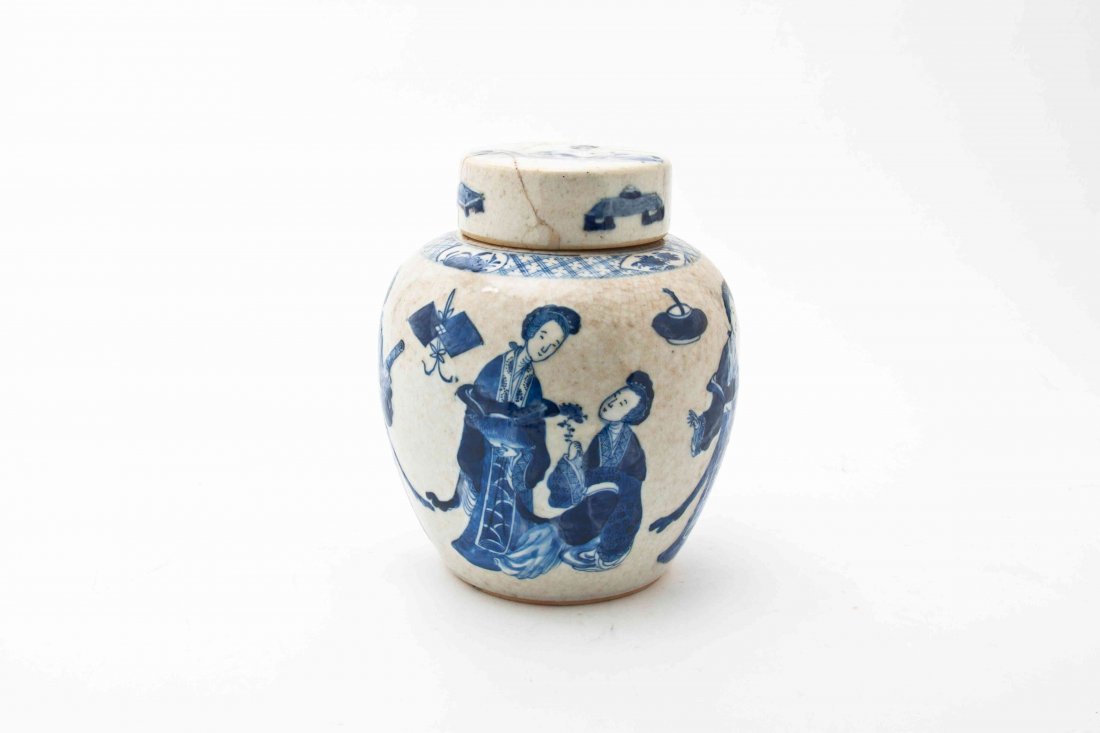 A Chinese Blue and White Covered Ginger Jar, Height ove: A Chinese Blue and White Covered Ginger Jar, depicting two ladies amongst traditional vessels and objects. Height overall 8 1/4 inches.