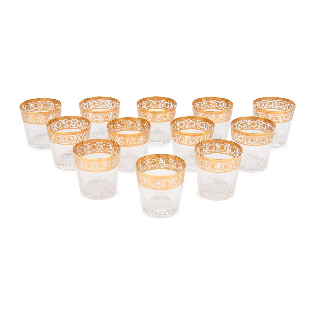 A Set of Twelve Saint-Louis Thistle Old Fashioned Glasses: A Set of Twelve Saint-Louis Thistle Old Fashioned Glasses 20th Century Height 3 3/4 x diameter 3 3/4 inches. Property from the Estate of Richard and Annette Bloch, Kansas City, Missouri This lot is lo