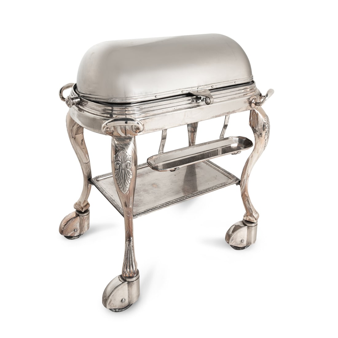 A Silver-Plate Roast Trolley: A Silver-Plate Roast Trolley 20th Century Height 41 x width 36 x depth 24 inches. This lot is located in Chicago.