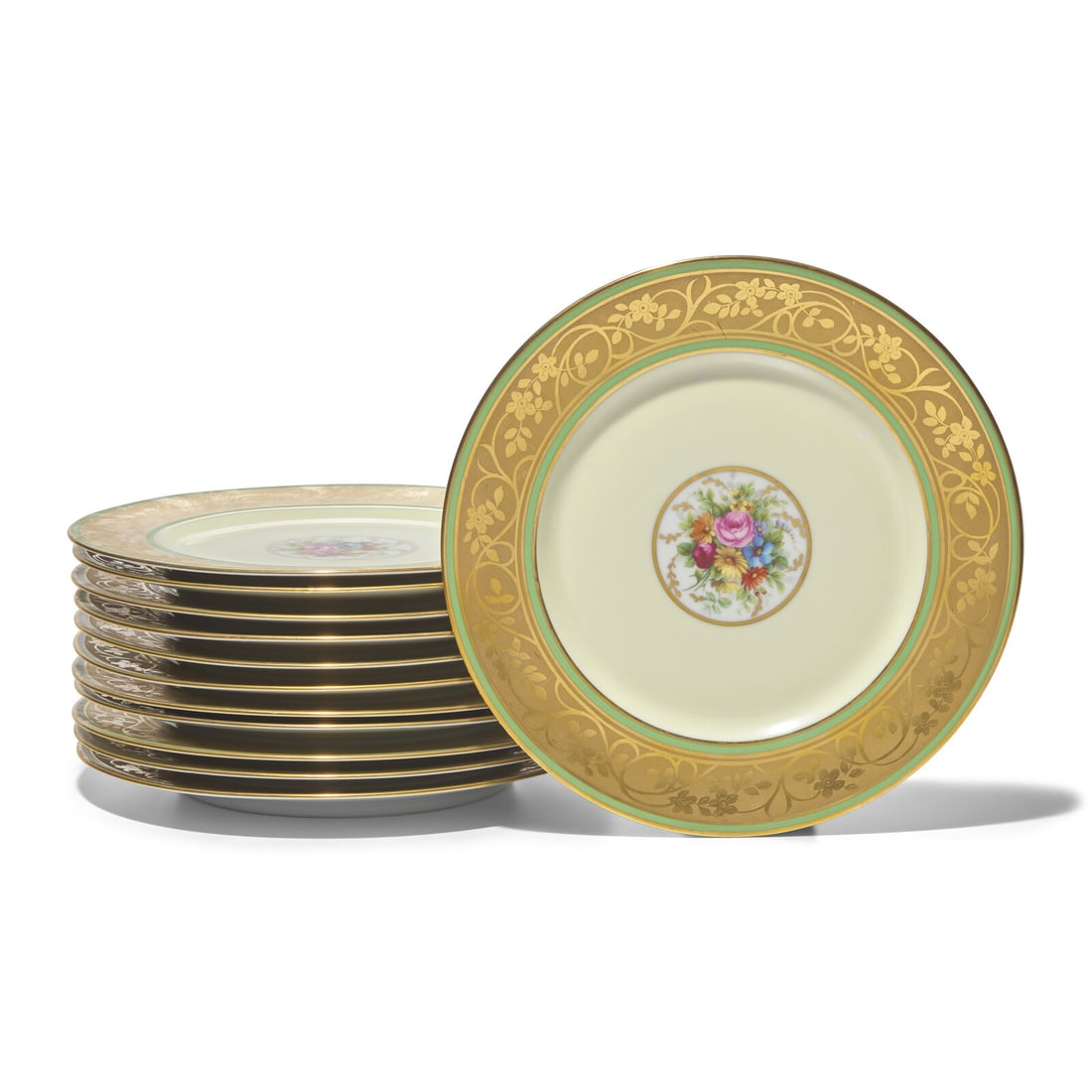 A Set of Twelve Limoges Porcelain Chargers (1 of 4)