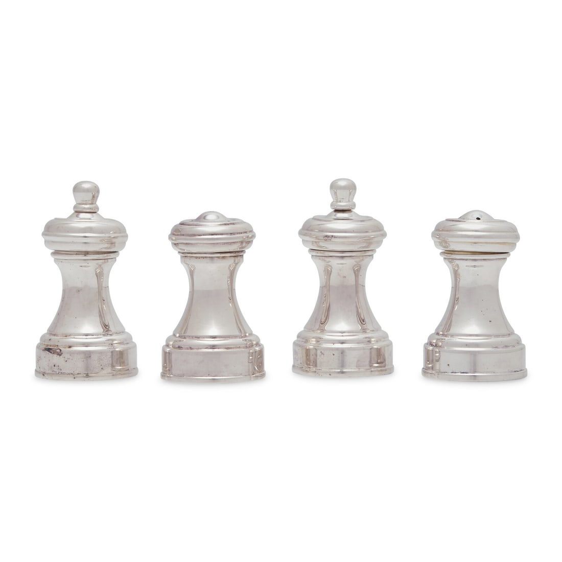 Two Tiffany and Co. Silver Salt and Pepper Sets: Two Tiffany and Co. Silver Salt and Pepper Sets Italy, 20th Century comprising two salt shakers and two pepper grinders, marked "Tiffany & Co./ Italy/ 925". 2 ozt 11 dwt weighable Height of larges