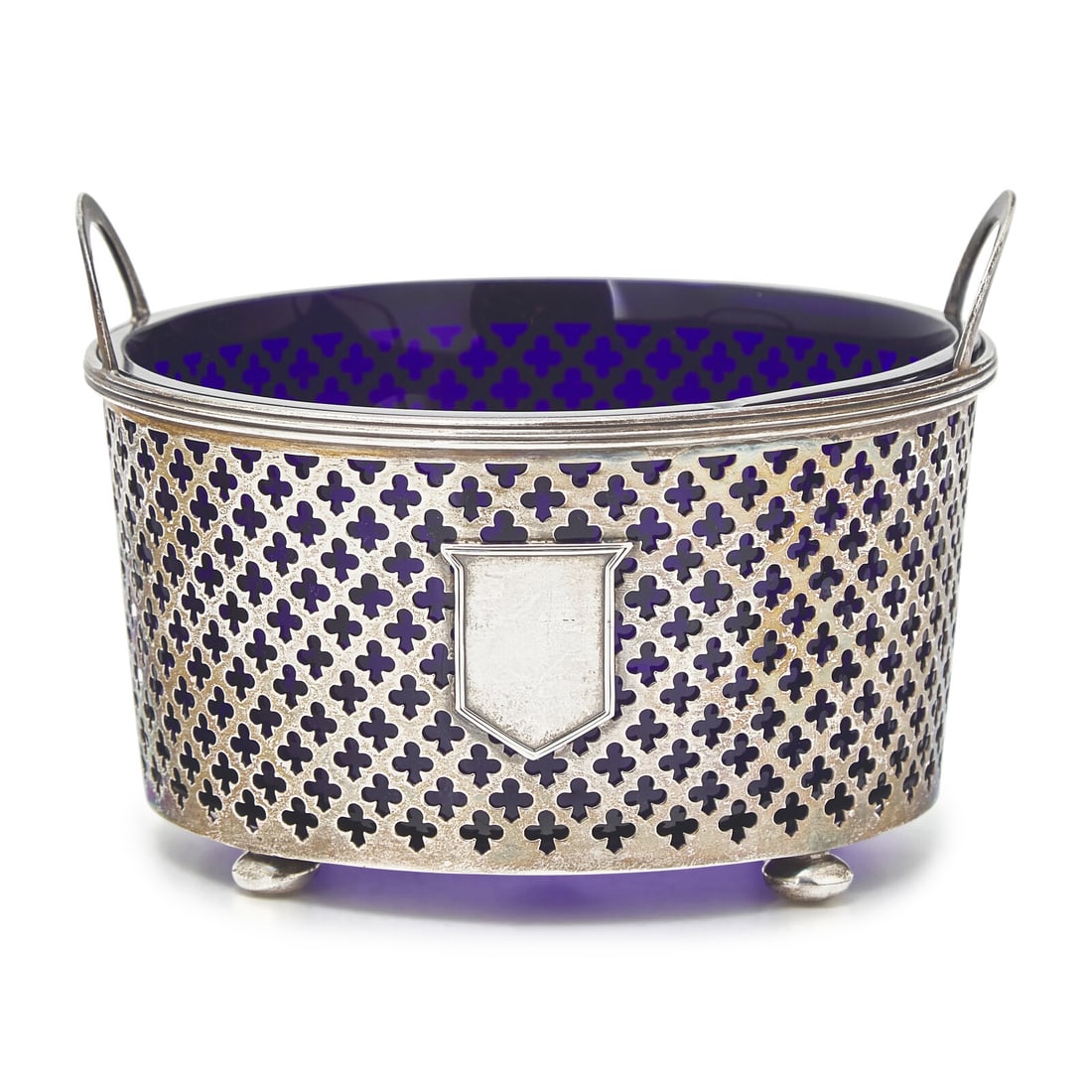 An American Pierced Silver Sugar Bowl: An American Pierced Silver Sugar Bowl Watson Co., Attleboro, MA, 20th Century fitted with a cobalt glass liner marked 'Sterling' to underside 4 ozt 4 dwt (silver only) Height 3 3/4 x width 5 3/8 inche