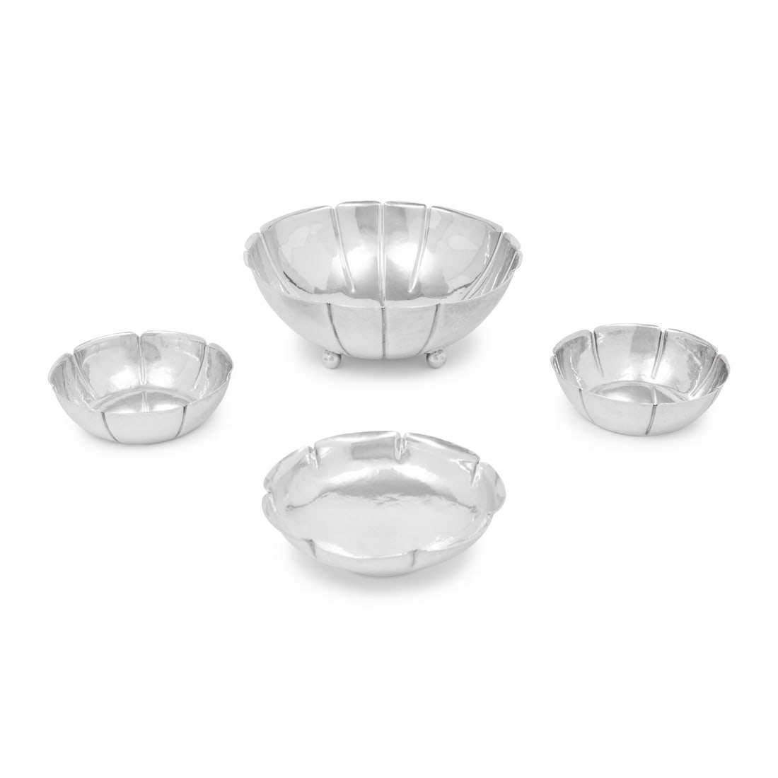 A Group of Four American Arts and Crafts Silver Bowls: A Group of Four American Arts and Crafts Silver Bowls Early 20th Century comprising three examples marked for Joel F. Hewes, the other example marked for J.L. Locke. each marked 'Sterling' and 'Handma